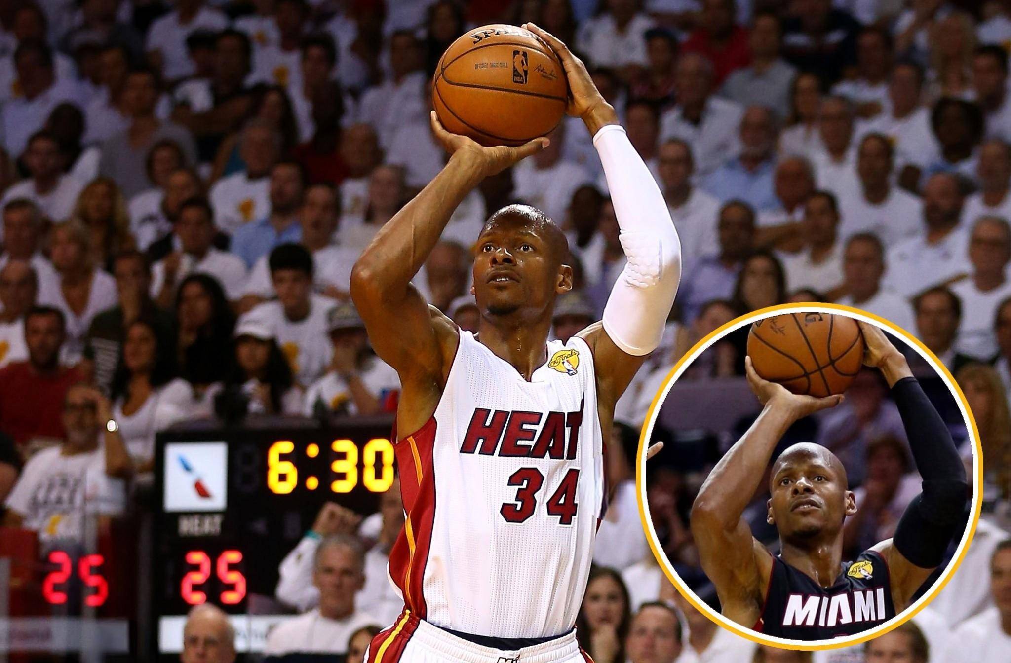 篮球赛场上球员投篮姿势优美 篮球赛场上球员投篮姿势优美