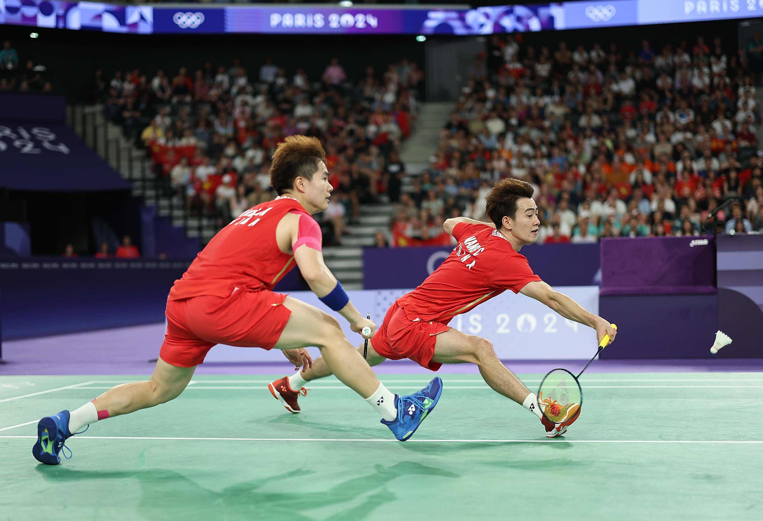 羽毛球男子团体赛选手实力对决